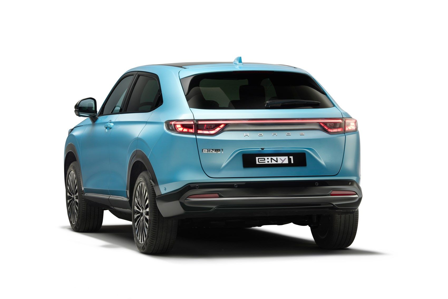 Honda e:Ny1 vs Toyota Corolla Cross Hybrid: Comparativo Completo 2026